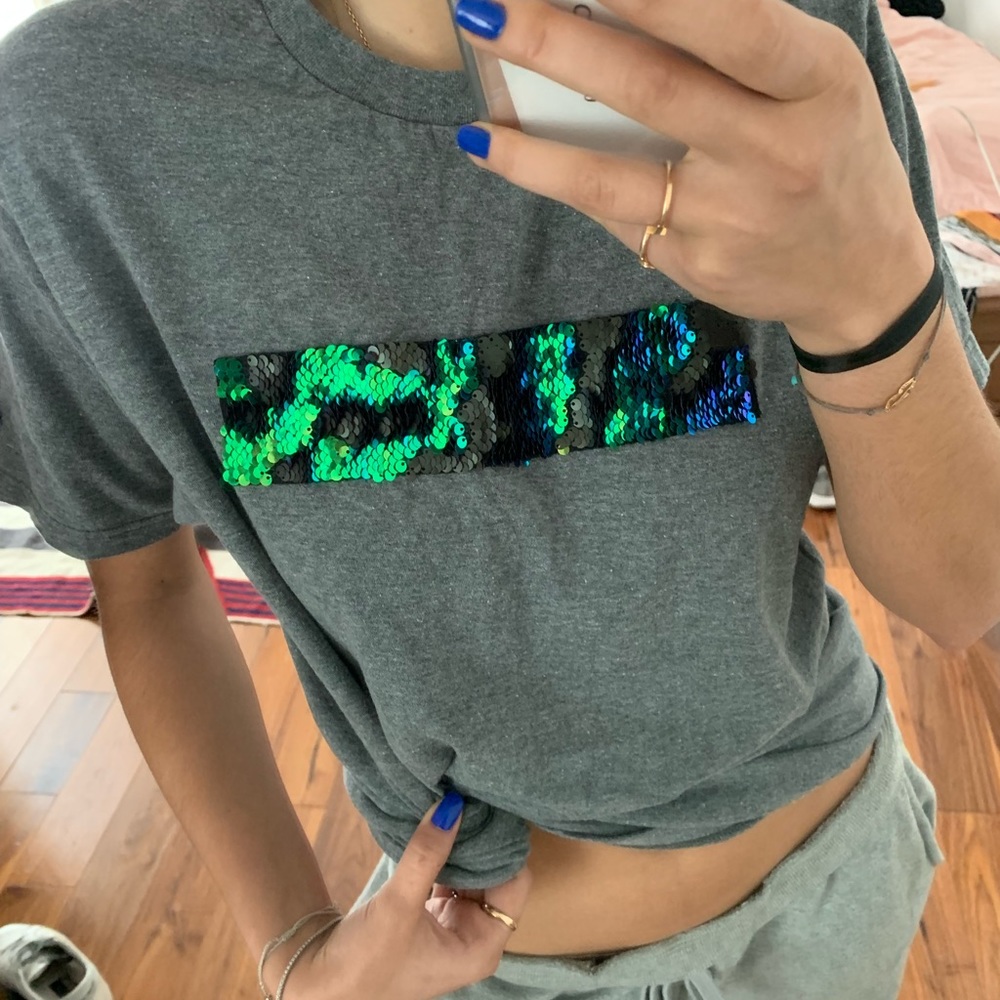 Cute tee with sequin front. Never worn